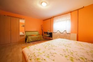 Postel nebo postele na pokoji v ubytování Apartment Tomašević