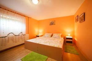 Postel nebo postele na pokoji v ubytování Apartment Tomašević