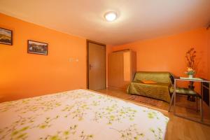 Postel nebo postele na pokoji v ubytování Apartment Tomašević