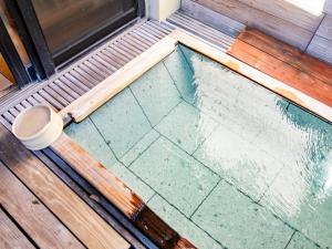 Kolam renang di atau dekat dengan Kirishima Momijidani Seiryuso - Vacation STAY 63048v +4 gambar