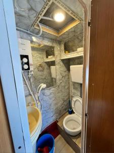 a small bathroom with two toilets and a sink at KUNDASANG MOUNT GARDEN in Kampong Kundassan +123 photos