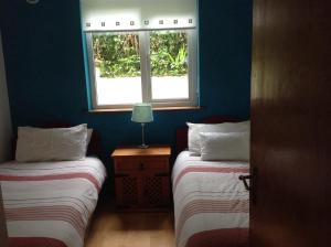 Letto o letti in una camera di Divine Mercy B&B