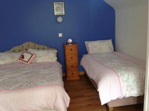 Letto o letti in una camera di Divine Mercy B&B