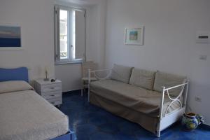 Posteľ alebo postele v izbe v ubytovaní La Casa di Cirro