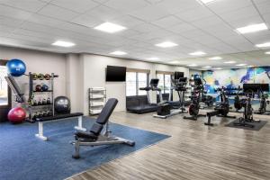 a gym with treadmills and exercise equipment in a room at Hyatt Place Colorado Springs Garden Of The Gods in Colorado Springs