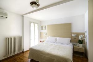 Voodi või voodid majutusasutuse Hotel Paradiso toas