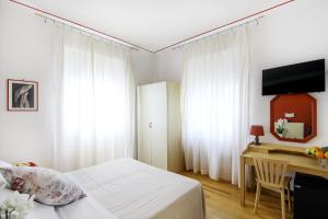 Voodi või voodid majutusasutuse Hotel Paradiso toas