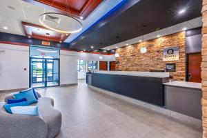 Posezení v ubytování Quality Inn & Suites
