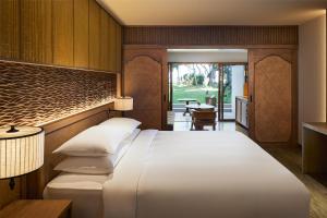 Hyatt Regency Bali客房内的一张或多张床位