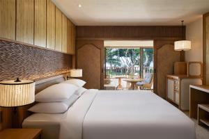 Hyatt Regency Bali客房内的一张或多张床位