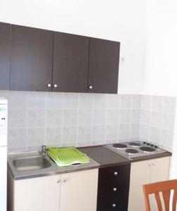 Kuchyňa alebo kuchynka v ubytovaní Studio Apartments Izabela