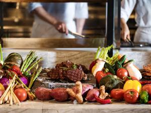 a bunch of vegetables on a table in a kitchen at Hotel Onoma Daejeon, Autograph Collection in Daejeon +86 photos