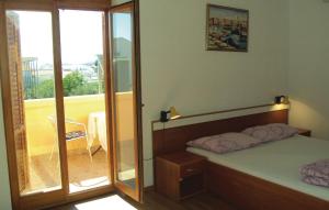 Posteľ alebo postele v izbe v ubytovaní Studio Apartments Izabela