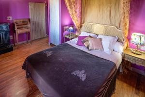 Postel nebo postele na pokoji v ubytování Hotel Alma de Romero
