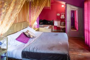 Postel nebo postele na pokoji v ubytování Hotel Alma de Romero