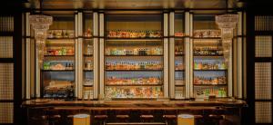 a bar with a lot of bottles of alcohol at Hyatt Regency Tokyo in Tokyo