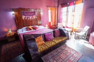 Postel nebo postele na pokoji v ubytování Hotel Alma de Romero