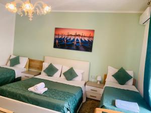 Postel nebo postele na pokoji v ubytování VENICE NIGHT APPARTMENT