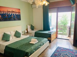 Postel nebo postele na pokoji v ubytování VENICE NIGHT APPARTMENT