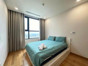 Postel nebo postele na pokoji v ubytování Căn hộ dịch vụ 3 phòng ngủ The Zei Lê Đức Thọ - Mỹ Đình
