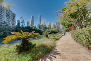 a path in a park with a city in the background at Limited Time Rate! One Bedroom, Heart of Gold Coast!!! in Gold Coast +21 photos