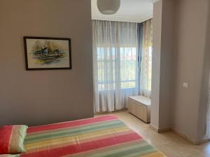 Giường trong phòng chung tại Lena's Guesthouse