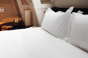 Pillows Grand Boutique Hotel Maurits at the Park - Small Luxury Hotels客房内的一张或多张床位