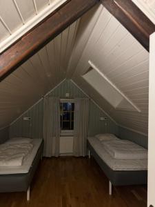 Cama o camas de una habitación en Sjösala