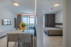 Giường trong phòng chung tại Residence Panorama Apart Hotel +86 ảnh
