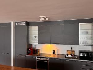 Kuchyň nebo kuchyňský kout v ubytování Sea front Apartment Aker Brygge