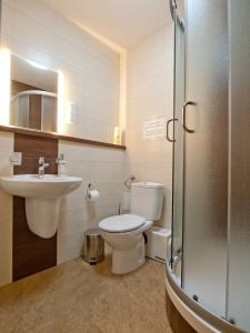 Kúpeľňa v ubytovaní Apartamenty studio Metropolio Centrum