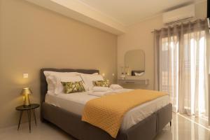 Ένα ή περισσότερα κρεβάτια σε δωμάτιο στο Solena Luxury Apartment