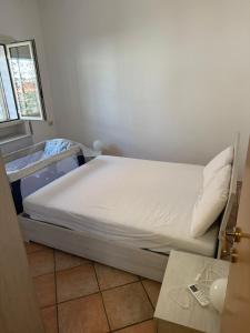 Katil atau katil-katil dalam bilik di Casa vacanza privata +4 gambar