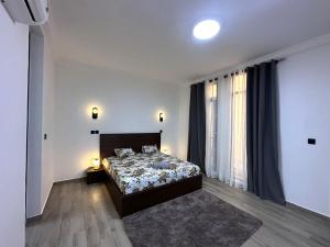 Postel nebo postele na pokoji v ubytování Villa Solaya + 26 fotografií