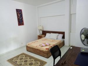 Casa Cacheu Homestay Guest House客房内的一张或多张床位