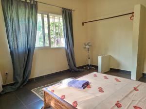 Casa Cacheu Homestay Guest House客房内的一张或多张床位