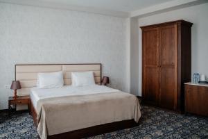 Postel nebo postele na pokoji v ubytování Sota Metekhi Hotel Tbilisi