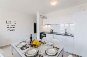 Kuchyň nebo kuchyňský kout v ubytování Apartment in Crikvenica 39077