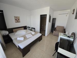 Postel nebo postele na pokoji v ubytování Complex Casa Ani + 17 fotografií