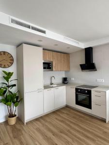 Kuchyň nebo kuchyňský kout v ubytování Apartamento en Playa de Gandia + 11 fotografií