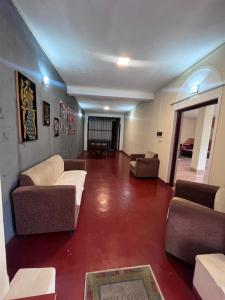 Area soggiorno di Sunbloom Hostel