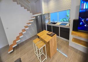 Η κουζίνα ή μικρή κουζίνα στο Cactus Villa 2024, 4 BEDROOM
