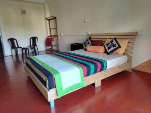 Letto o letti in una camera di Sunbloom Hostel