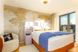 Ένα ή περισσότερα κρεβάτια σε δωμάτιο στο MOLO LIPNO RESIDENCE +227 φωτογραφίες