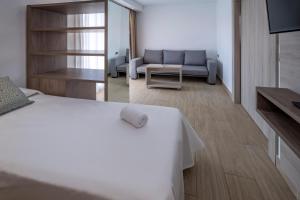 Posteľ alebo postele v izbe v ubytovaní 4R Salou Park Resort II
