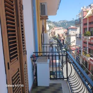 a balcony with a view of a city at Casa Vacanze Donna Lia in Giardini Naxos