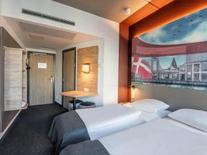 Postel nebo postele na pokoji v ubytování B&B HOTEL Aalborg