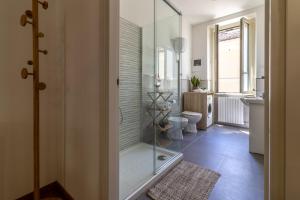a bathroom with a shower and a toilet in it at Casa Terenzio in Rieti +42 photos