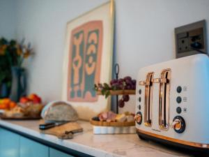 Фотография из галереи The Baleia Guesthouse Knysna в городе Найсна