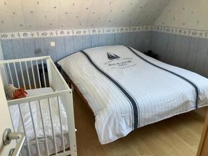 Postel nebo postele na pokoji v ubytování Bleu-De-Toi